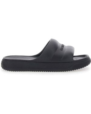 Moncler Slippers With Embossed Logo - Black