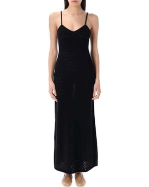 THE GARMENT Das Kleidungsstück kleidet sich schwarz