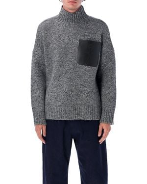JW Anderson Les pulls jw anderson gris