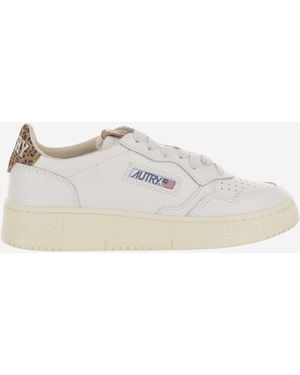 Autry Low-Top Leather Trainers With Suede Heel Tab And Logo Accents - White