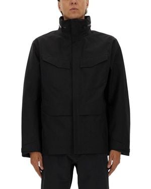 Veilance Schleimjacke mit faltbarer Kapuze - Schwarz