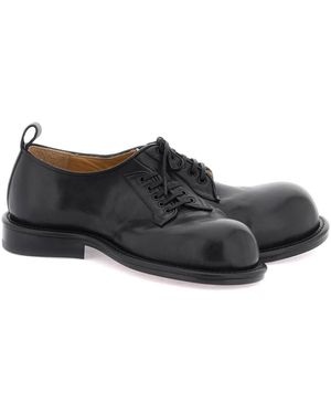 Comme des Garçons "Doppelkipps -Derby -Schuhe von Comme des Garçons - Schwarz