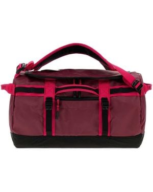 The North Face Fuchsia Fabric Duffel Base Camp Xs Travel Bag - Purple
