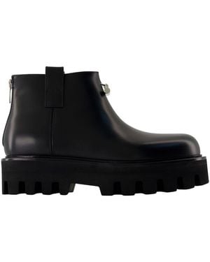 McQueen Bottes de la cheville Leather noir