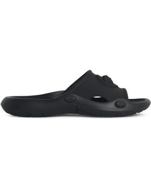 Versace Schwarze Gummipantoffeln von - Weiß