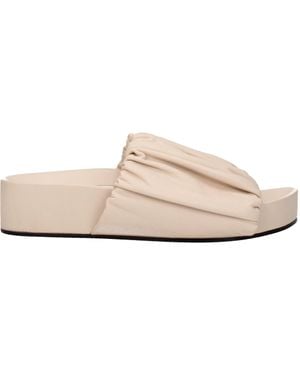 Jil Sander Zapatillas y cascos para mujeres de piel rosa/rosa en polvo de piel - Neutro