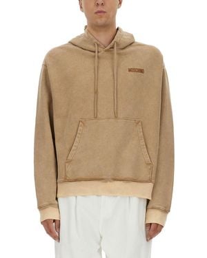 Moschino Washed Hoodie With Logo And Studded Design - Natural