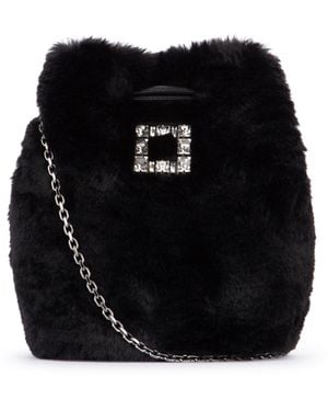 ショルダーバッグ・ポシェット Roger Vivier TRES VIVIER DAISY AUMONIERE Roger Vivier Tres Vivier Daisy Aumoniere in Black | Lyst