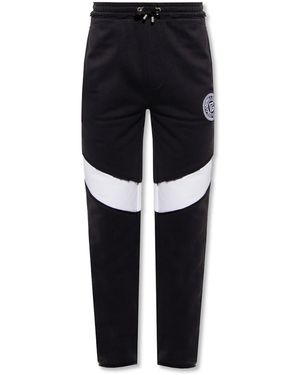 Balmain Pantaloni in cotone neri con stampa logo - Nero