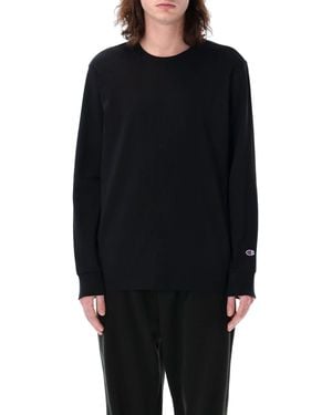 Champion T -Shirts und Polos schwarz