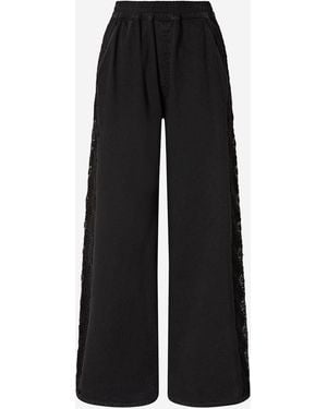 Pinko Jeanshose mit seitlichem Spitzenband - Schwarz