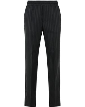 Versace Pantalones de lana jacquard negros