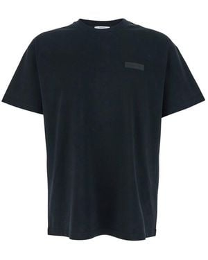 Givenchy Black Crewneck T-shirt With Logo Patch On The Front In Cotton Man