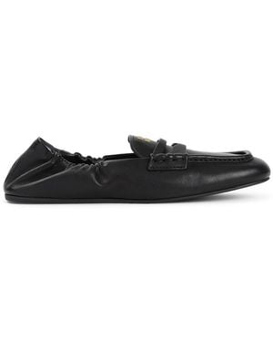 Miu Miu Elegant Moccasin Loafers - Black