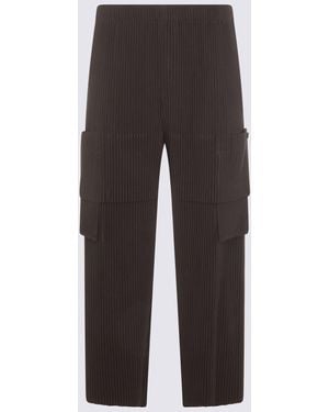 Homme Plissé Issey Miyake Pantaloni Grigio - Brown
