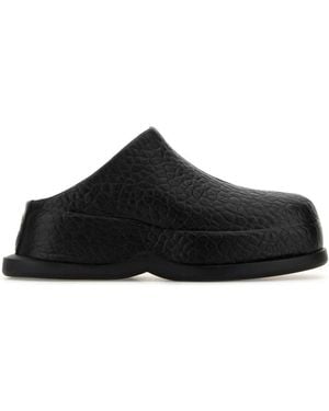 Alexander McQueen Skull-Embossed Leather Mules - Black