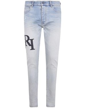 Amiri "Staggered Logo" Skinny Jeans - Blue
