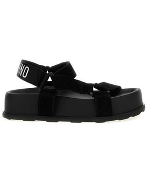 Moschino Flat sandals for Women | Online Sale up to 60% off
