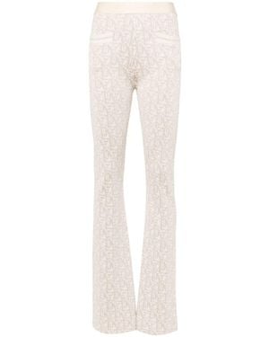 パンツ PALM ANGELS MONOGRAM JACQUARD KNIT TROUSERS Palm Angels Monogram-Jacquard Knitted Trousers in Black | Lyst