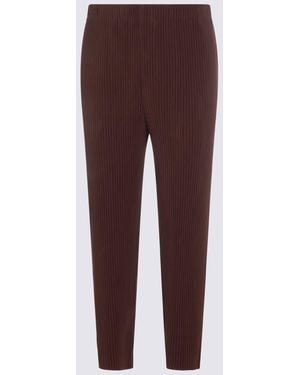 Homme Plissé Issey Miyake Pantaloni Marrone - Purple