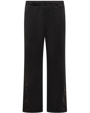 Gcds Trousers With Embossed Logo - Black