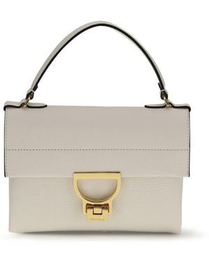 Coccinelle Clutches - Natural