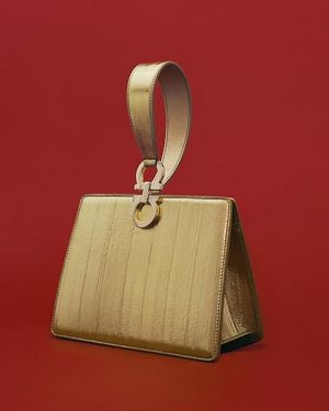 Ferragamo Small Metallic Leather Clutch - Yellow