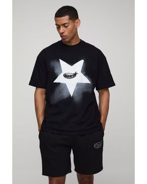 Boohoo Conjunto Oversize De Pantalón Corto Y Camiseta Con Aplique De Estrella Bm - Negro