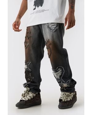 BoohooMAN Tall lockere Jeans mit Applikation - Schwarz