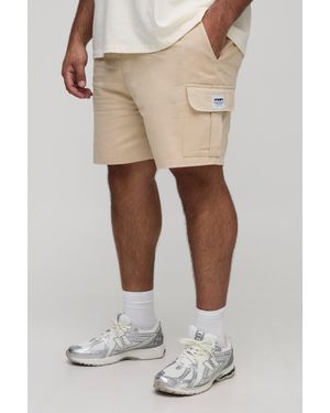 BoohooMAN Plus Elasticated Waist Relaxed Fit Woven Tab Cargo Shorts - Natural