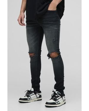 BoohooMAN Super Skinny Washed Ripped Knee Jeans - Black