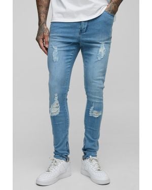BoohooMAN Tall zerrissene Super Skinny Jeans mit Reißverschluss - Blau