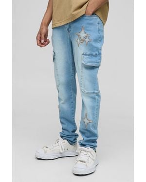 BoohooMAN Skinny Cargo-Jeans mit Sternen-Applikation - Blau