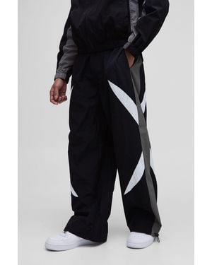 BoohooMAN Elasticated Waist Parachute Side Stripe Pants - Black