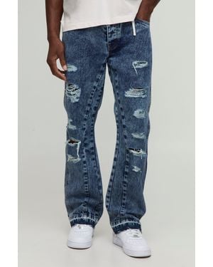 BoohooMAN Slim Flared Ripped Gusset Jeans With Let Down Hem - Blue