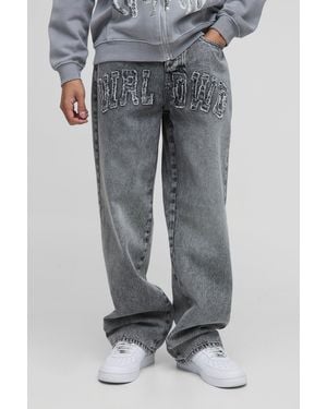 Boohoo Vaqueros Holgados Con Lavado A La Piedra Y Apliques Wrldwd - Gris