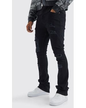 BoohooMAN Skinny Stacked Distressed Ripped Jeans - Black