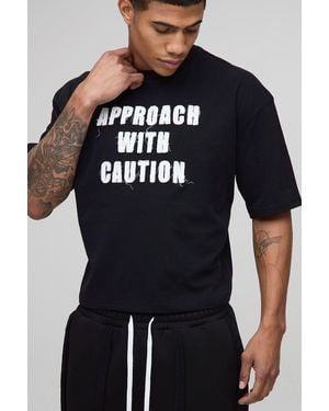 BoohooMAN Shrunken Caution Slogan Distressed Applique T-Shirt - Blau