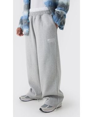 BoohooMAN Pantalón Deportivo De Pernera Ancha Con Atadura En La Botamanga Y Cintura Doble - Gris