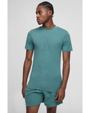 BoohooMAN Muscle Fit Extended Neck Peached Bm Embossed T-Shirt & Shorts Set - Green