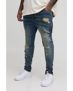 BoohooMAN Plus Skinny All Over Ripped Bleached Paint Splatter Jeans - Blue