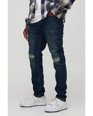BoohooMAN Slim Vintage Jeans mit Riss am Knie - Blau