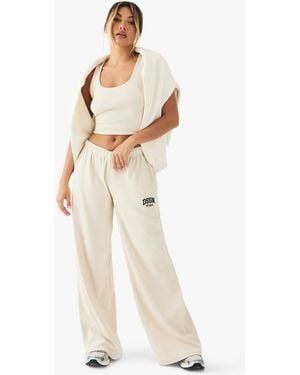 BoohooMAN Dsgn Studio Embroidered Rib Mid Waist Trouser - Natural