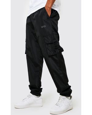 BoohooMAN Elasticated Waist Slim Fit Shell Cargo Sweatpants in Green for Men  | Lyst UK