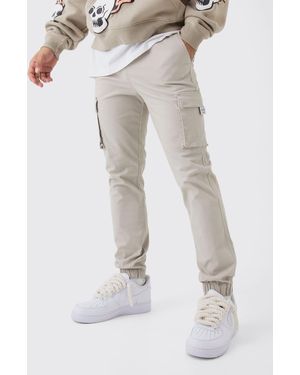 BoohooMAN Pantalón Cargo Ajustado Con Cintura Elástica Y Etiqueta De Tela Con Botamanga - Blanco