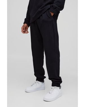 BoohooMAN Tall Jacquard Regular Pin Tuck Sweatpants - Black