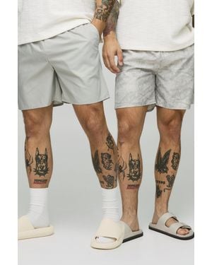 BoohooMAN 2er-Pack mittellange Camouflage Badehose - Grau
