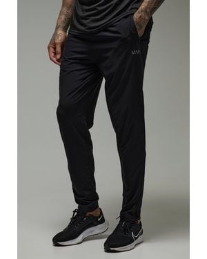BoohooMAN Tall Active Performance Lightweight Stretch Woven Tapered Sweatpants - Black
