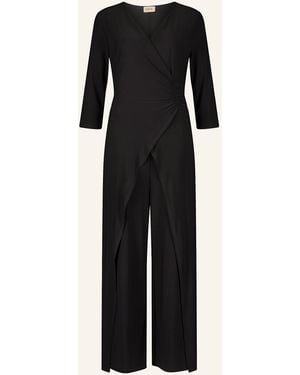 Cartoon Jumpsuit in Wickeloptik mit 3/4-Arm - Schwarz