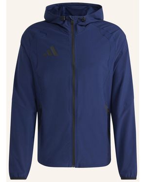 adidas TIRO TRAVEL WINDBREAKER - Blau